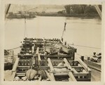 Workers on Wooden Structure Constructing Dam