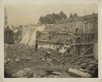 Workers Constructing Wooden Frame for Concreting
