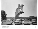 Railroad Bridge: 406-foot Lift Span Being Moved into Position with People Watching from the Bank by C. Quillen